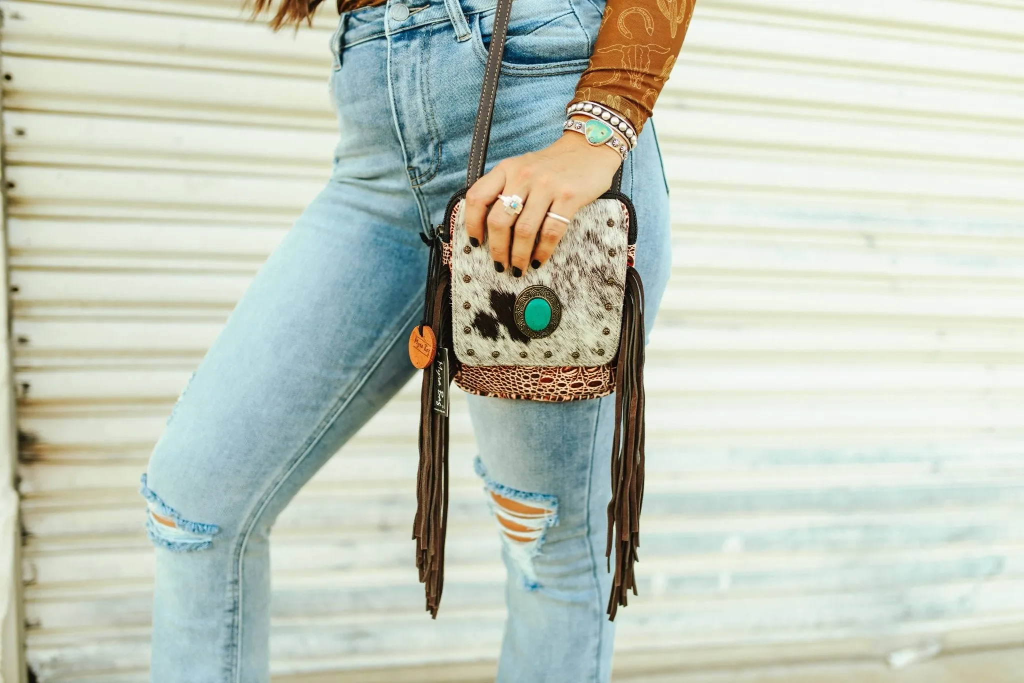 Cowhide Concho Fringed Leather Crossbody Bag