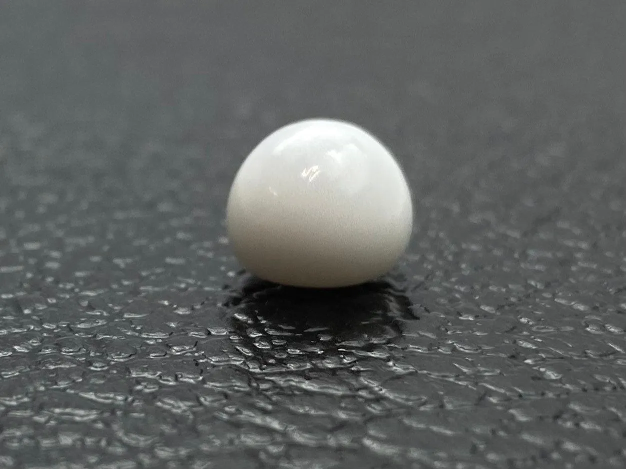 No.07 100% Natural Tridacna Pearl white Clam Pearl, 7.505 carat, 10.56mm x 8.64mm